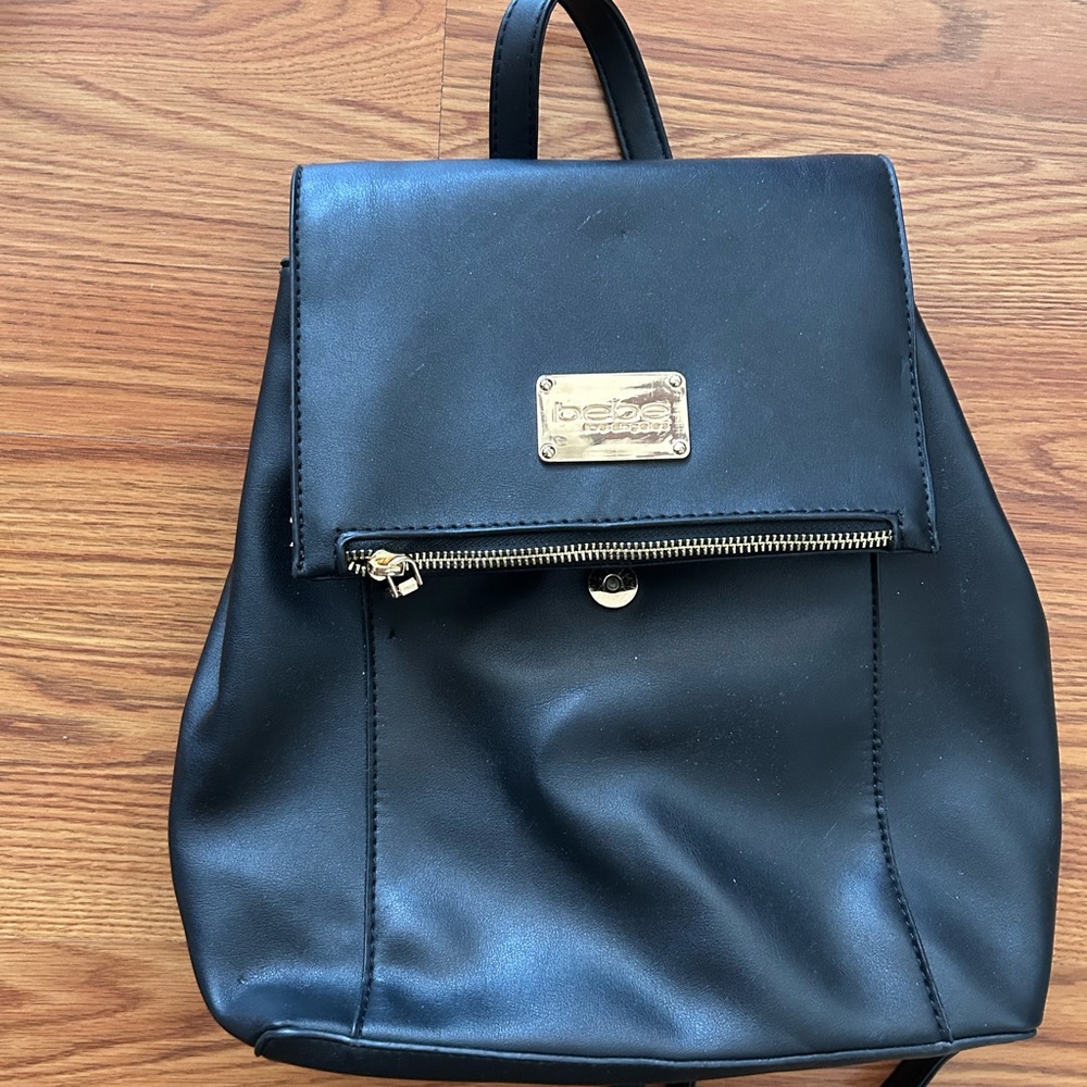Black Leather BeBe women Backpack with Gold Accents
